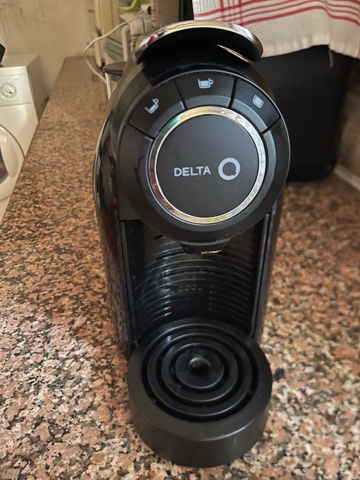 Máquina de café dela a funcionar bem