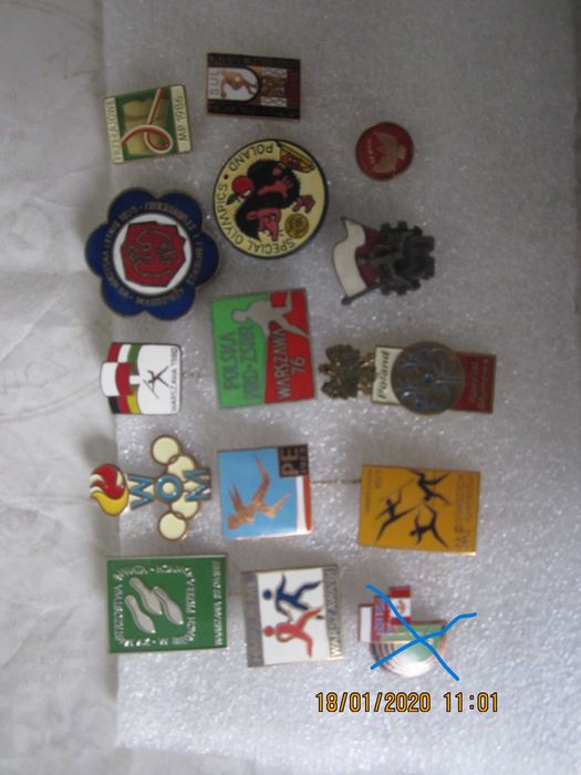 Odznaki sportowe z zawodów lekkoatletycznych