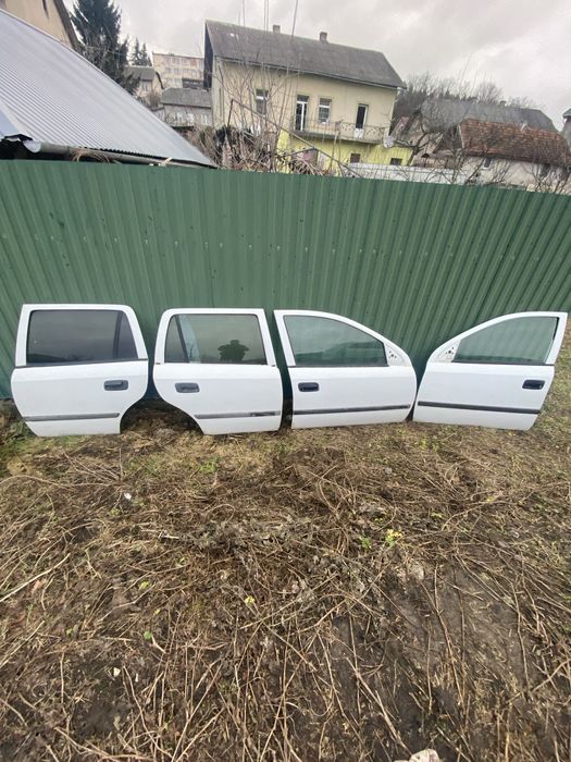 Двері Опель Астра g