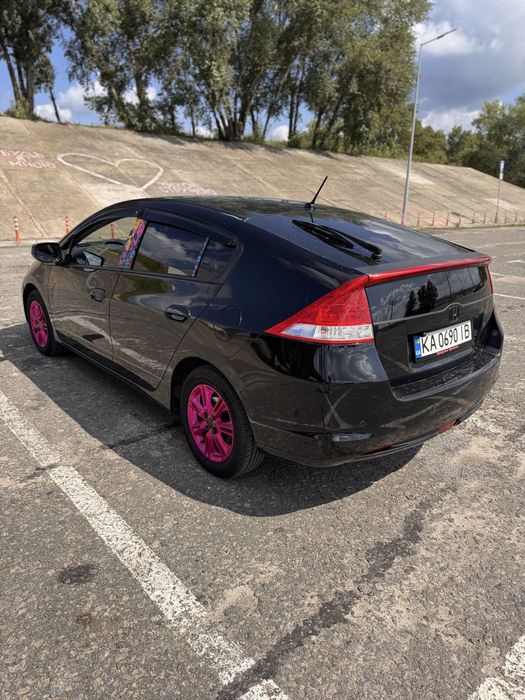 Honda Insight 2010 VIN JHMZE2850AS223144 фото оголошення 3 з 8