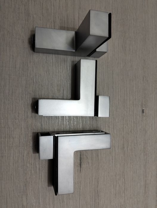 Тримачі для поличок