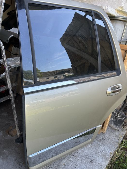 Lincoln Navigator mk3 2007- drzwi lewy tył