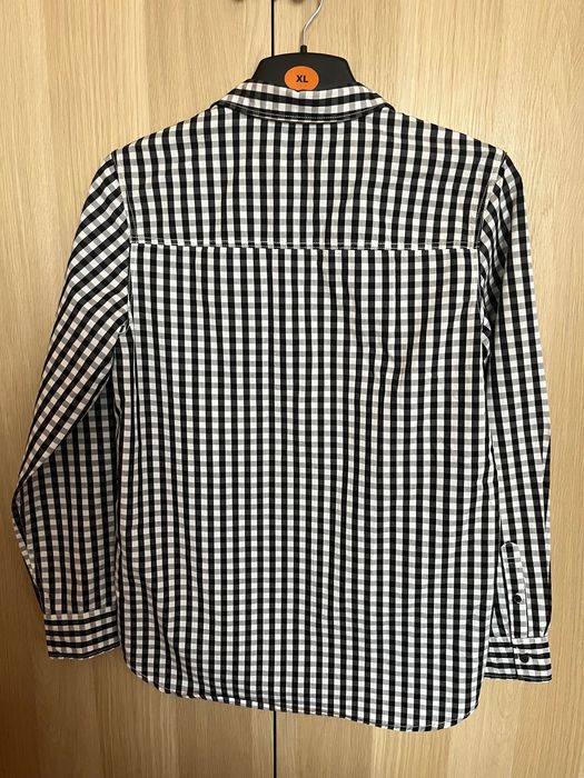 Vendo camisa preta e branca
