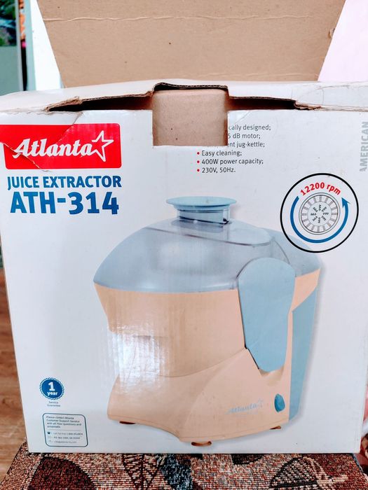 Соковыжималка электрическая