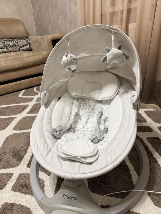 Заколисуючий центр гойдалка