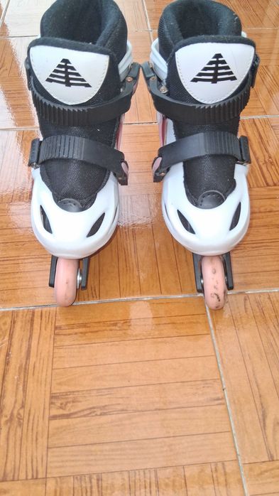 Patins cor de rosa criança