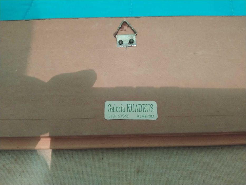 Quadro antigo em relevo