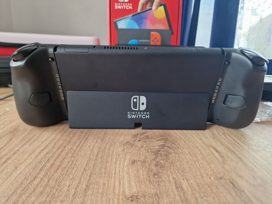 Nintendo Switch OLED + Ogromny Zestaw Akcesoriów! Mobapad M6-HD, Karta 256GB, Pady