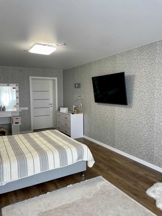 Продам простору дворівневу квартиру з сучасним ремонтом в новобудові.