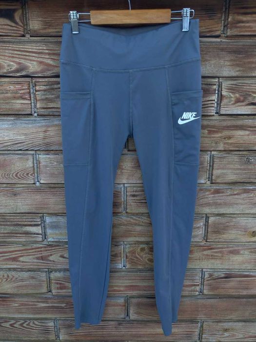 Жіночі сірі спортивні лосини nike