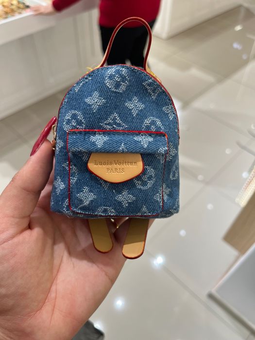 Mini mochila Porta moedas