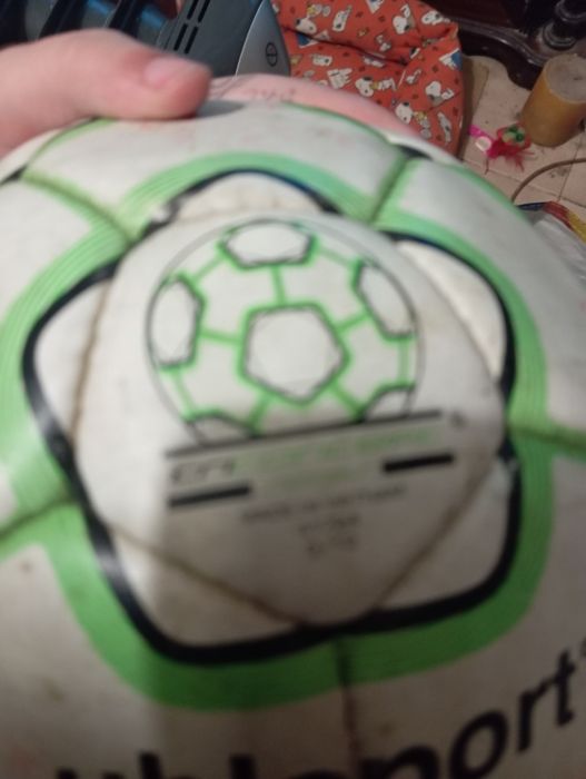 Bola assinada por jogadores