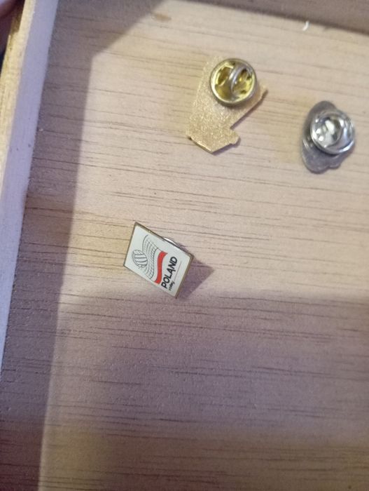 Pins Parker desporto