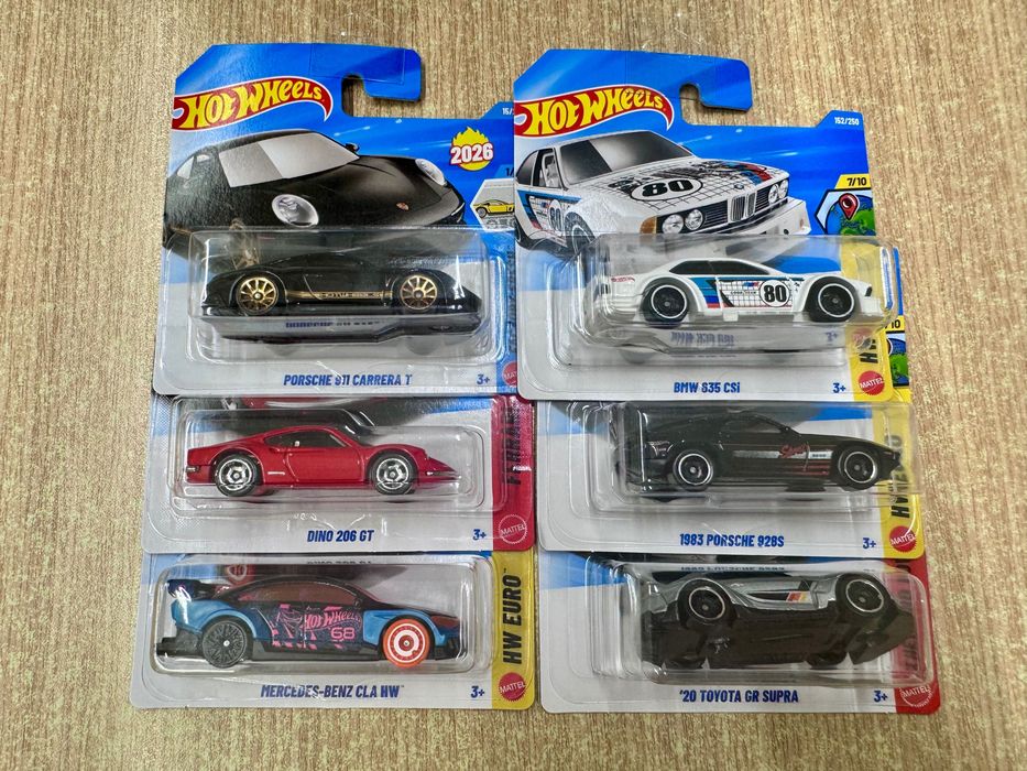 Hot Wheels cars of Mercedes-Benz, Ferrari, and Porsche