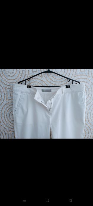 Класичні жіночі штани, бренд M&S.
 Білий колір, з поясом