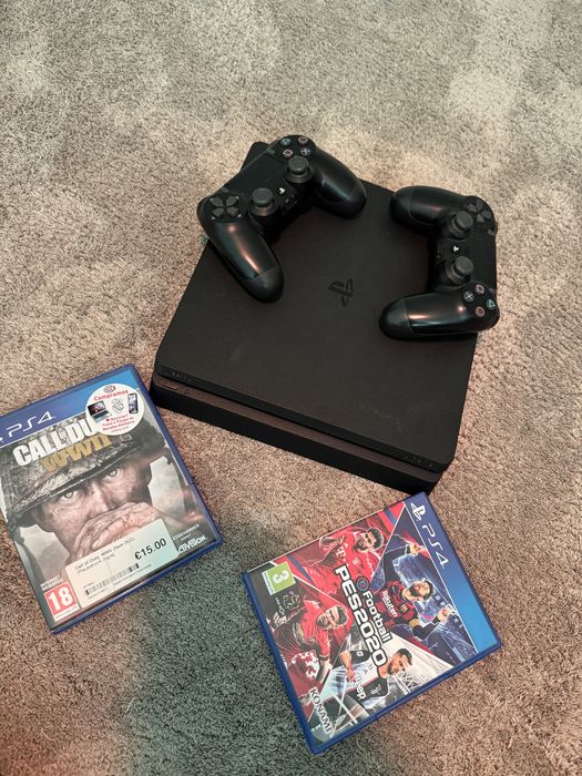 Playstation 4 slim / dois comandos e jogos
