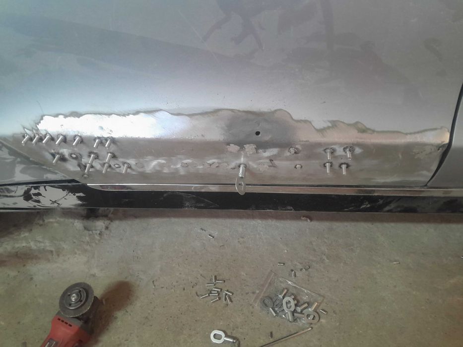 Тесла.Ауді Мерседес відновлення алюмінія рихтовка фарбування поліровка