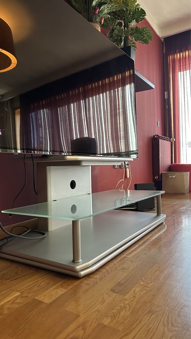 Base de TV rotativa cinza em vidro