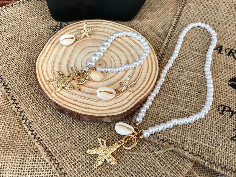 Piękny zestaw biżuterii:naszyjnik,kolczyki i bransoletka morski design