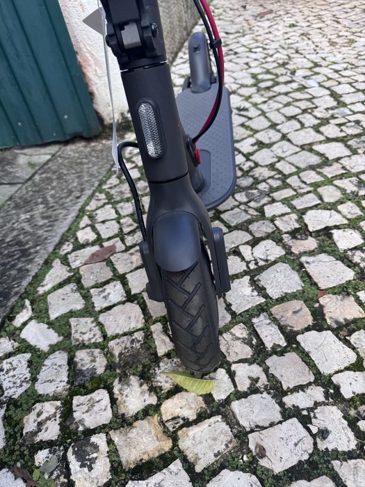 Trotinete Xiaomi  , com caixa e leva um capacete novo