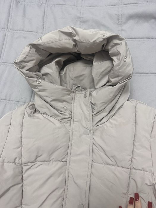 Зимовий довгий пуховик
