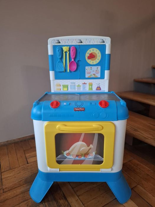 Kuchenka zabawkowa Fisher Price.