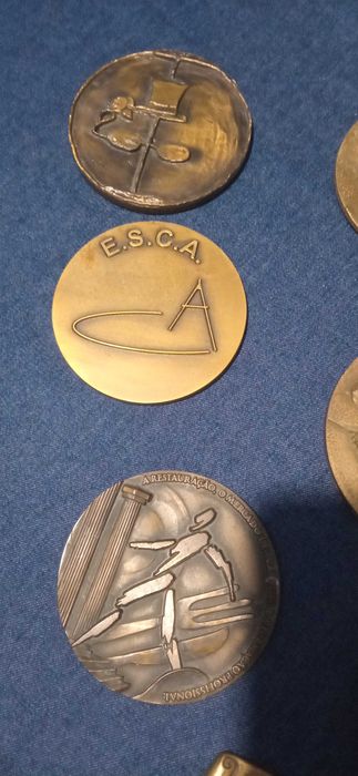 7 Medalhas/placas comemorativas em bronze
