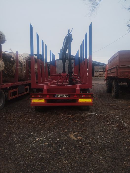 Напівпричіп лісової з лісовим краном навантажувачем