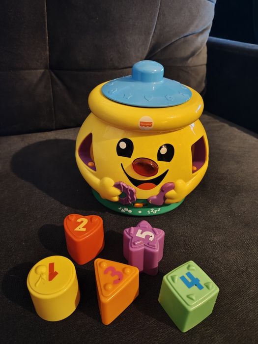 Fisher-Price, Garnuszek na klocuszek, zabawka