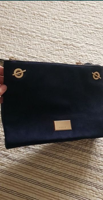 Mala parfois  azul escuro como  nova