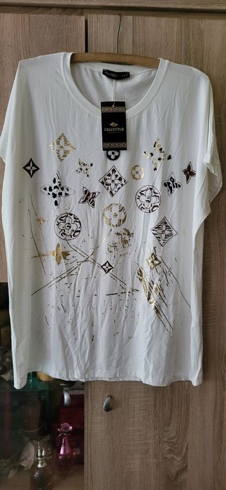 Sprzedam białą bluzeczkę Freestill.