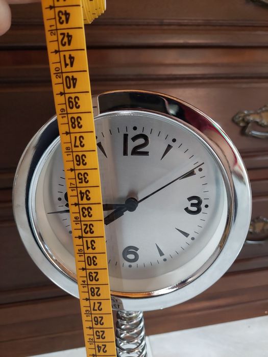 Relógio de mesa.