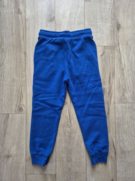 Jak nowe! Spodnie dresowe dziecięce, Cool Club, c. niebieskie, r 128