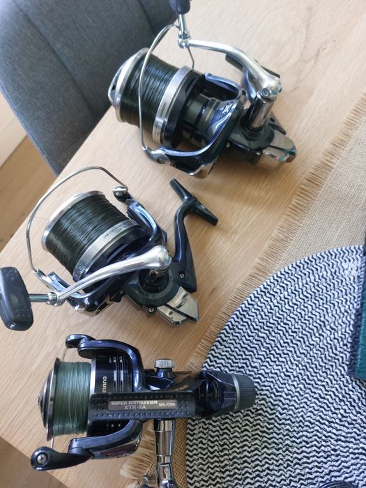 Wędki karpiowe kołowrotki pokrowiec avid solar shimano