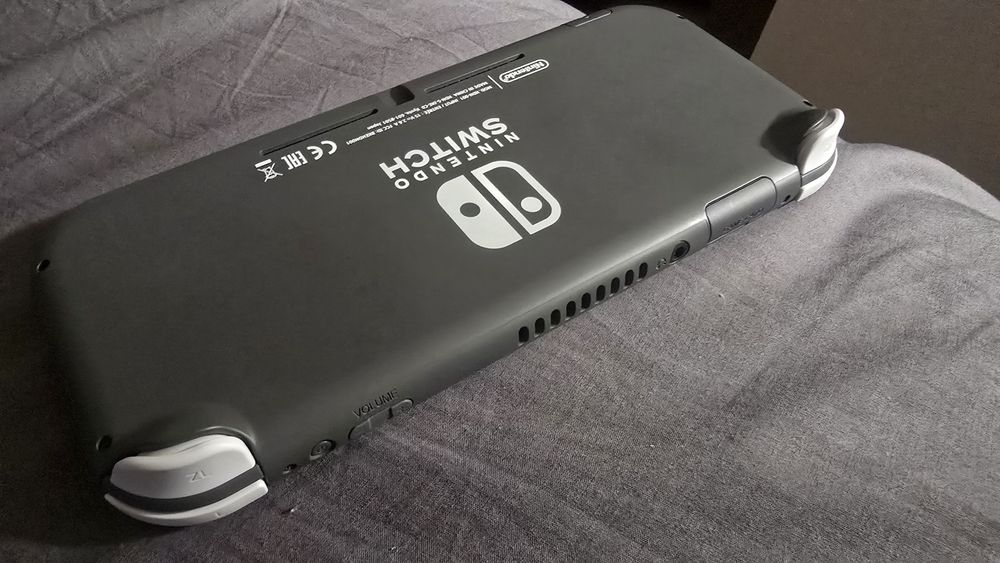 Nintendo Switch Lite (como nova) + capa