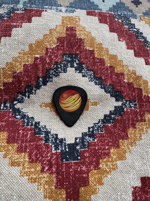 Piórko do gitary Coldplay