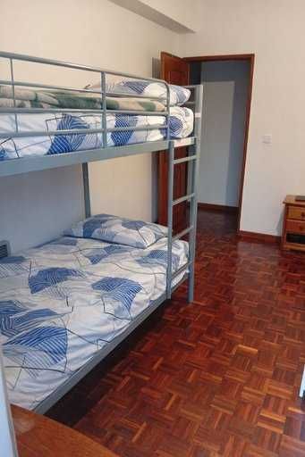 Cama em quarto partilhado