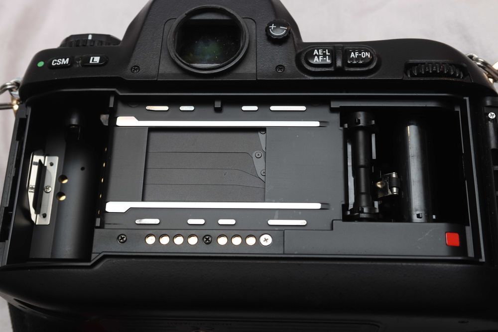 Nikon F100 + Nikon 1.8/50 E Series Stan idealny!