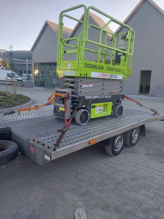 Wynajem lawety przyczepy auto pomoc drogowa wypozyczenie holowanie laweta transport Jelenia Gora Polska EU