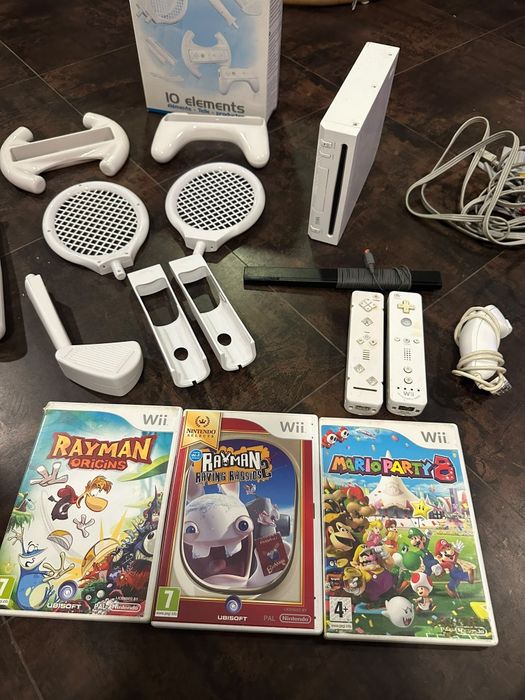 Wii + comandos + assécorios+ Jogos