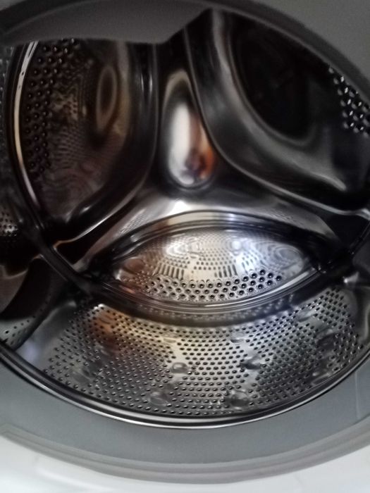 Máquina de lavar roupa como nova