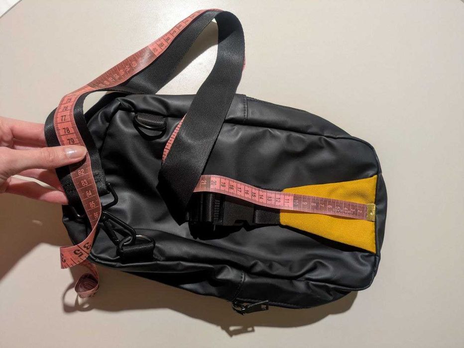 Męska saszetka nerka torba Reserved przez ramię