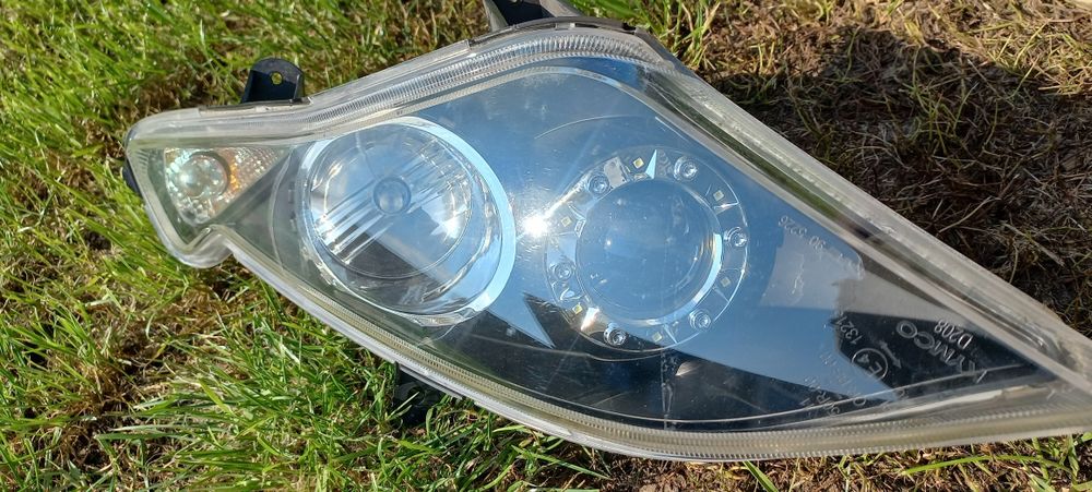 Lewa lampa kymco downtown 125 300