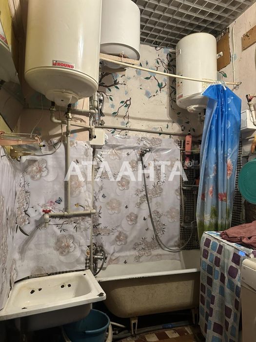 Продам двухуровневую комнату  в центре