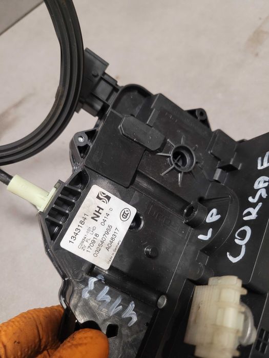Zamek drzwi lewy przód lewy przedni Opel Corsa E 134.318.41 6-PIN