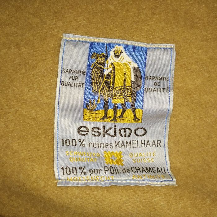 Тонка якісна вовняна ковдра