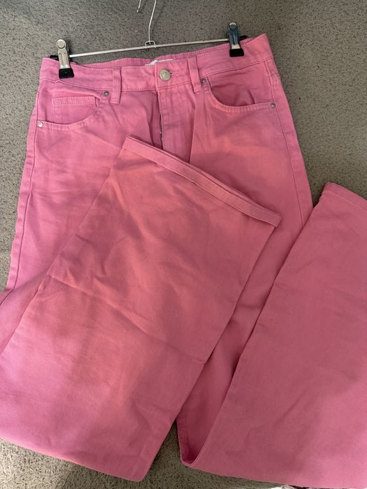 рожеві джинси кльош на розмір xs-s