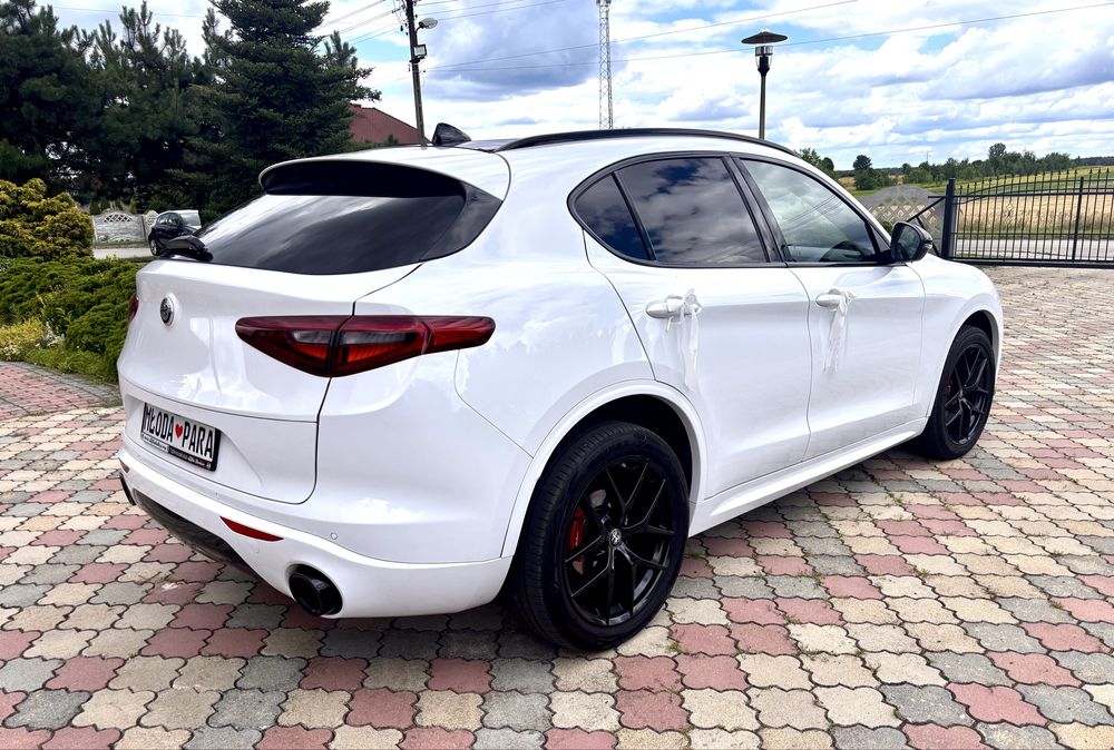 Biała elegancja- Alfa Romeo Stelvio samochód do ślubu z kierowcą Śląsk