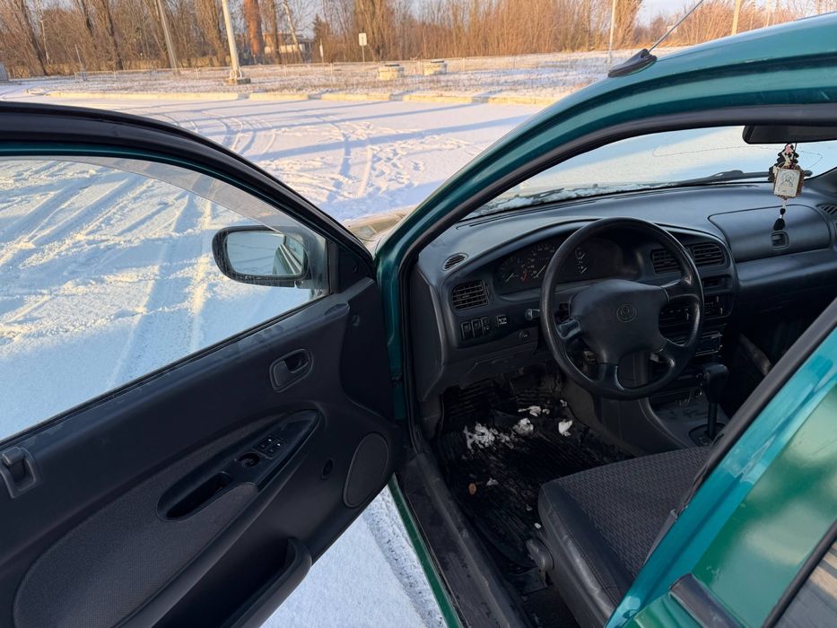 Продам Mazda 323