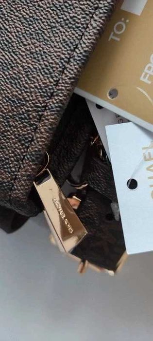 Michael Kors Saszetka nerka Brown